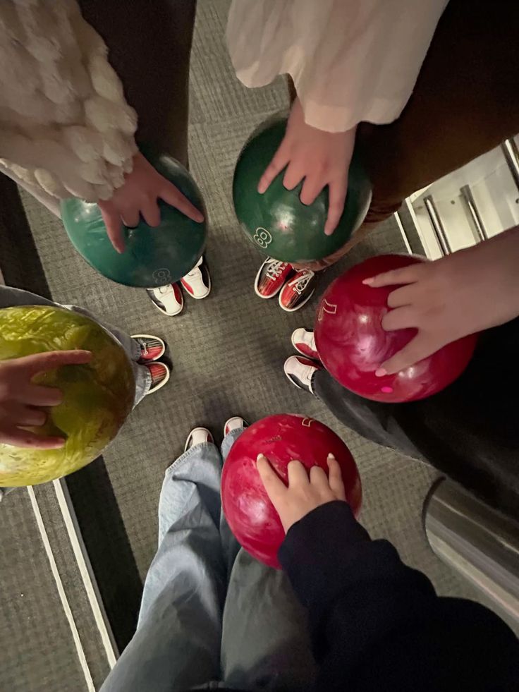 Friends bowling together